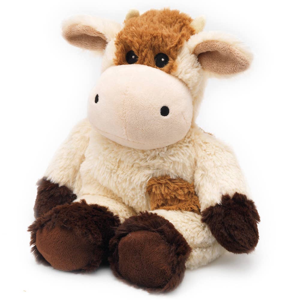 Plush cow toy with brown and beige colors on a white background