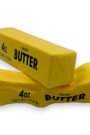 Two yellow blocks of butter with '4oz' and 'SALTED BUTTER' text on a white background