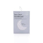 Silky satin pillowcase packaging with moon design on a white background