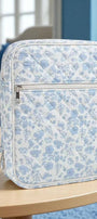 Blue floral zippered Bible cover with front pocket and adjustable strap