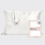 White satin pillowcase with packaging on a light gray background