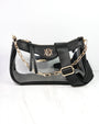 Black handbag with gold chain strap on a white background