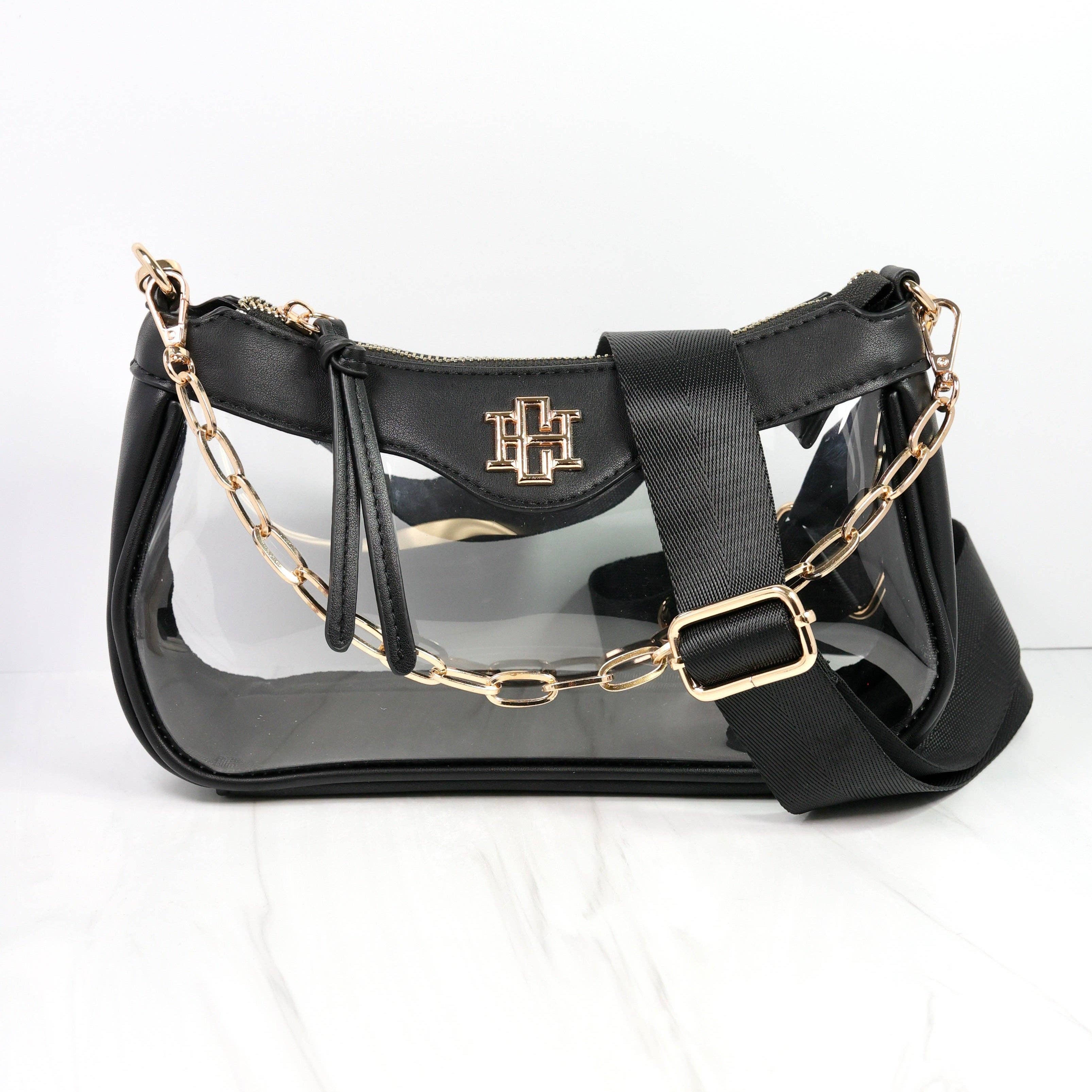 Black handbag with gold chain strap on a white background