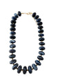 Chunky navy beaded necklace with gold clasp and oval bead links