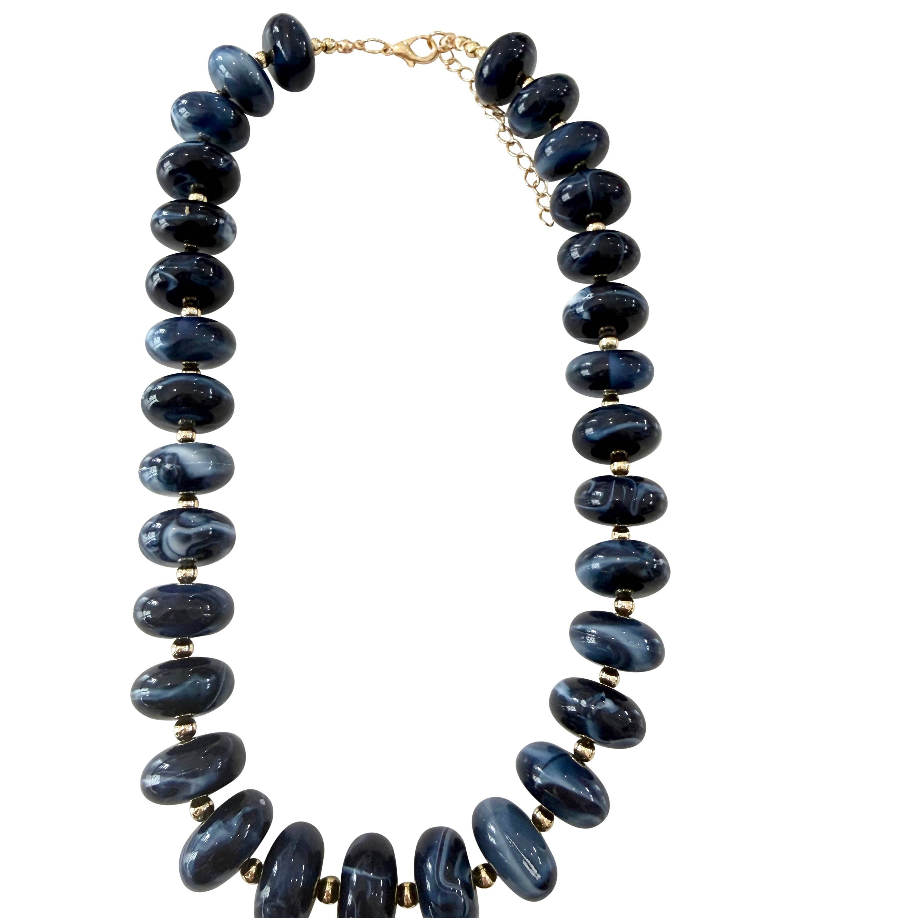 Chunky navy beaded necklace with gold clasp and oval bead links