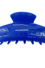 Blue hair clip with 'Lulu Mac' branding on a white background