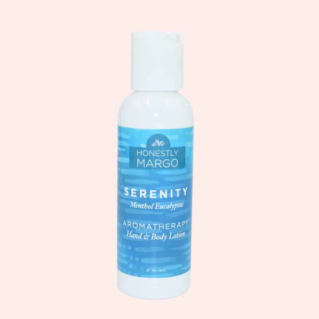Honesty Margo Serenity Aromatherapy Hand & Body Lotion bottle on a light pink background
