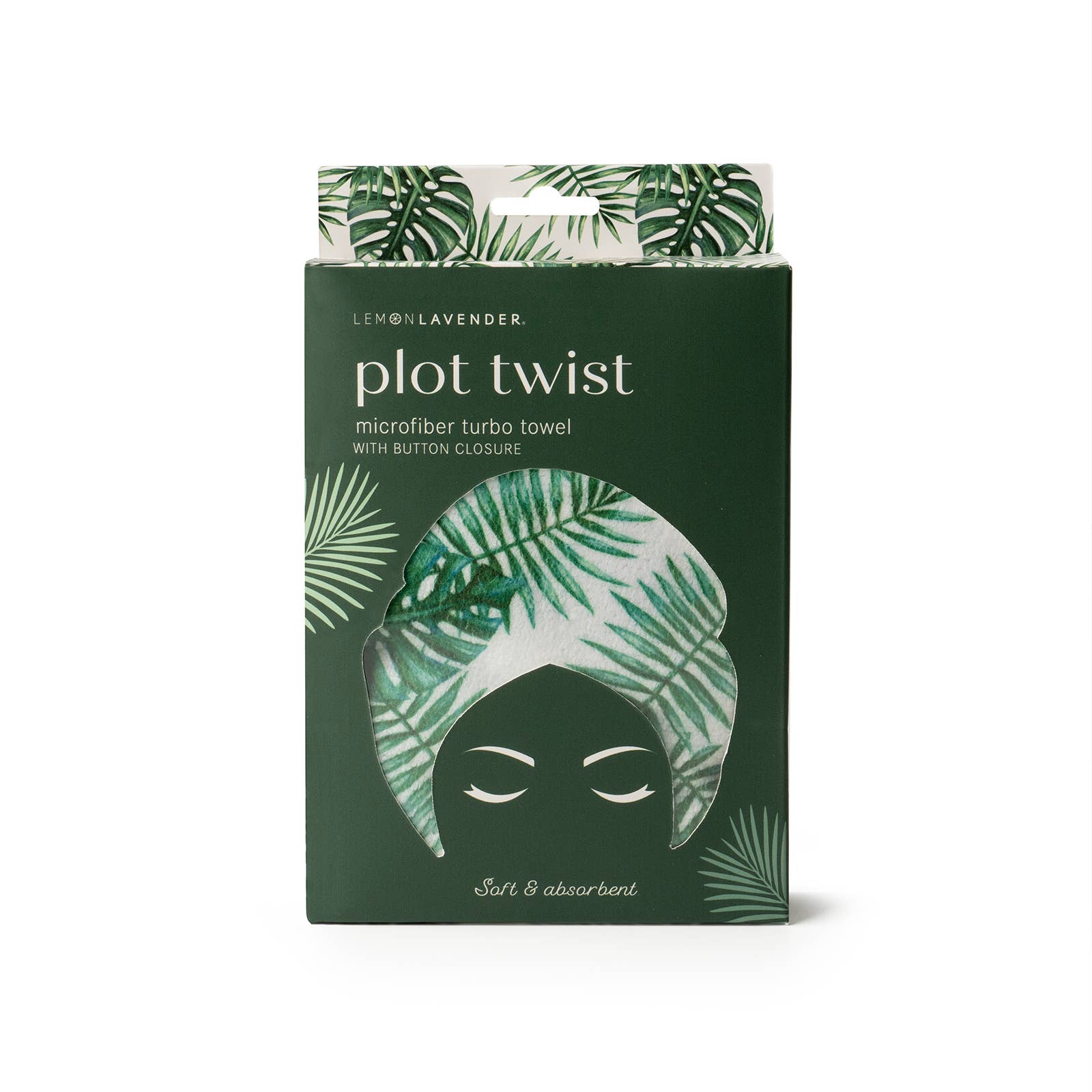 Packaging of a microfiber turban towel with tropical leaf design on a white background