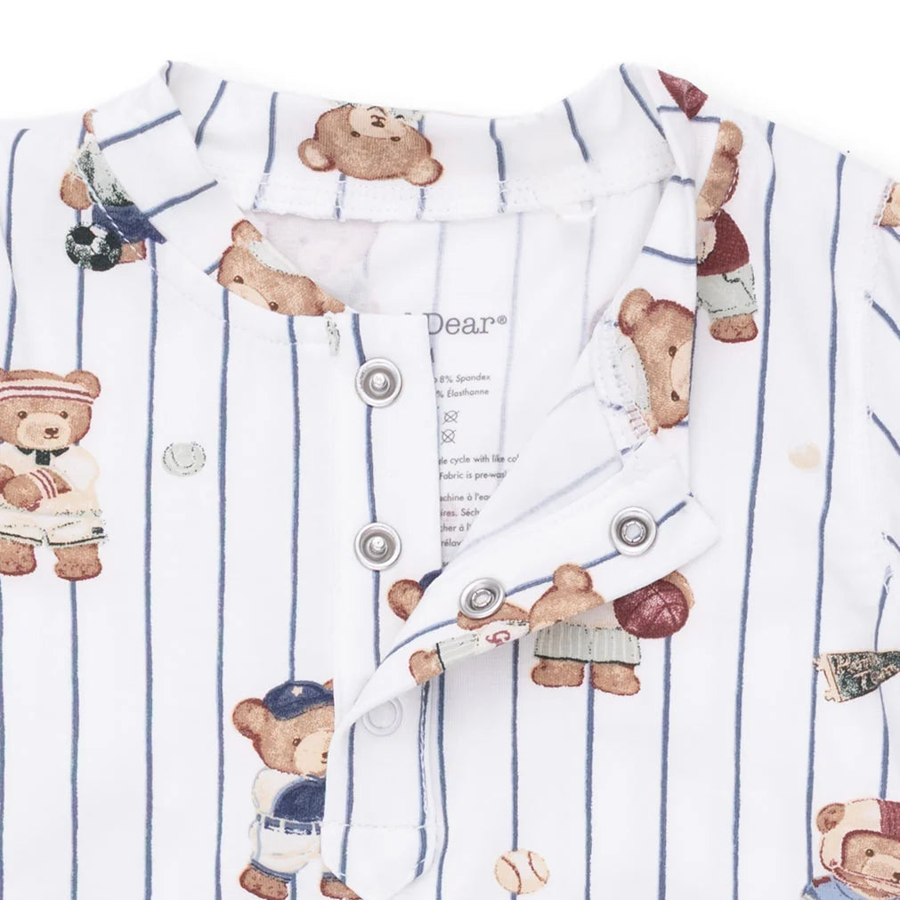 Children's shirt with teddy bear pattern and buttons on a white background