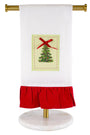 Towel with Christmas tree design on a stand against a white background
