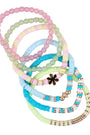Set of colorful beaded bracelets on a white background