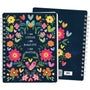 Notebook with floral design and motivational text on a white background