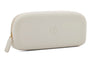 Cream colored silicone eyeglass case with Peepers logo on a white and blue striped background