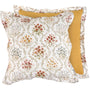 Floral-patterned pillow with a yellow accent on a white background