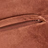 A close-up of a brown zipper with a matching brown pull tab.