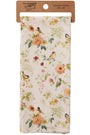 Floral and bird patterned kitchen towel with a wooden hanging ring on a white background