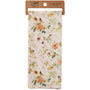 Floral and bird patterned kitchen towel with a wooden hanging ring on a white background