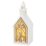 Lighted church with Christmas nativity silhouette