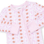 A pink long-sleeve baby sleep suit with a front zipper, featuring an all-over print of brown footballs, pink bows, and vertical pink stripes on a white background.