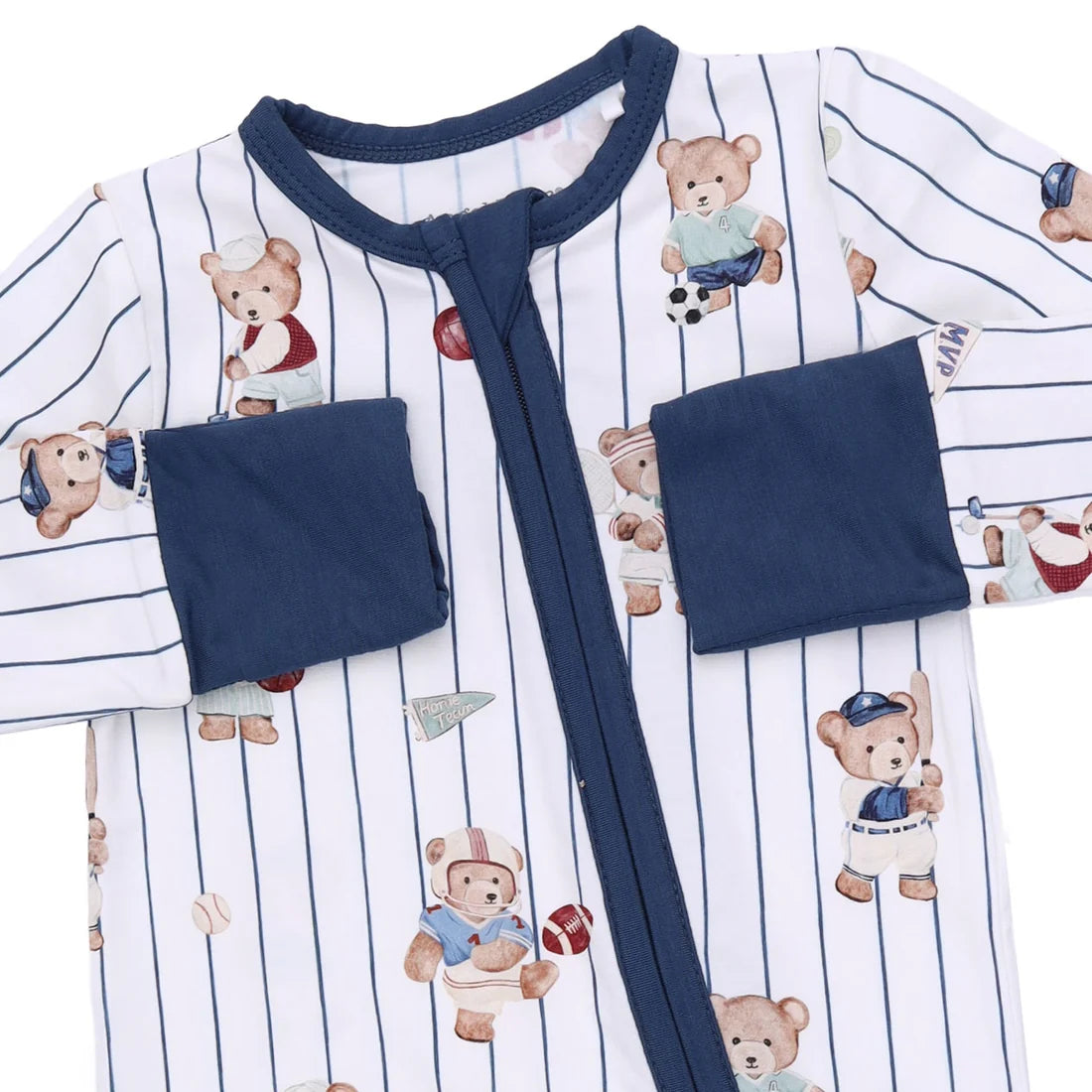 Baby onesie with teddy bear pattern and navy accents on a white background