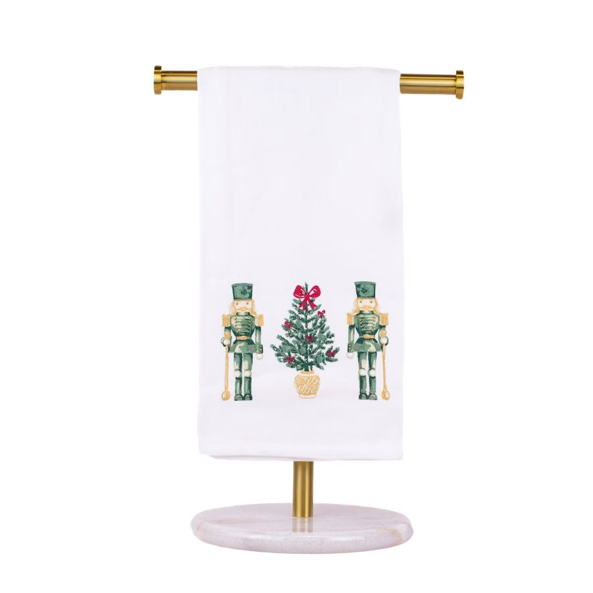 Decorative towel holder with a white towel featuring Christmas-themed designs on a white background