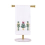 Decorative towel holder with a white towel featuring Christmas-themed designs on a white background