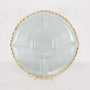 Clear glass plate with gold decorative rim on a white background