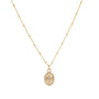 Gold necklace with a pendant on a white background