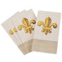 Set of beige napkins with gold fleur-de-lis designs on a white background