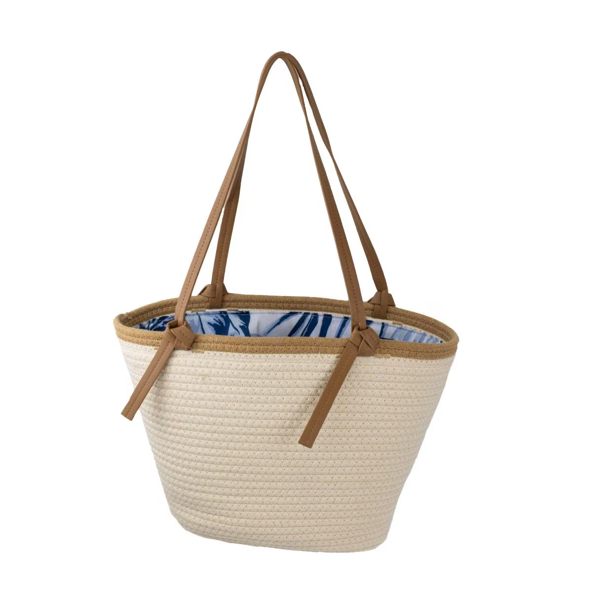 Beige woven tote bag with brown handles on a white background