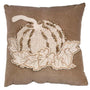 Decorative pillow with embroidered pumpkin and leaves on a brown background