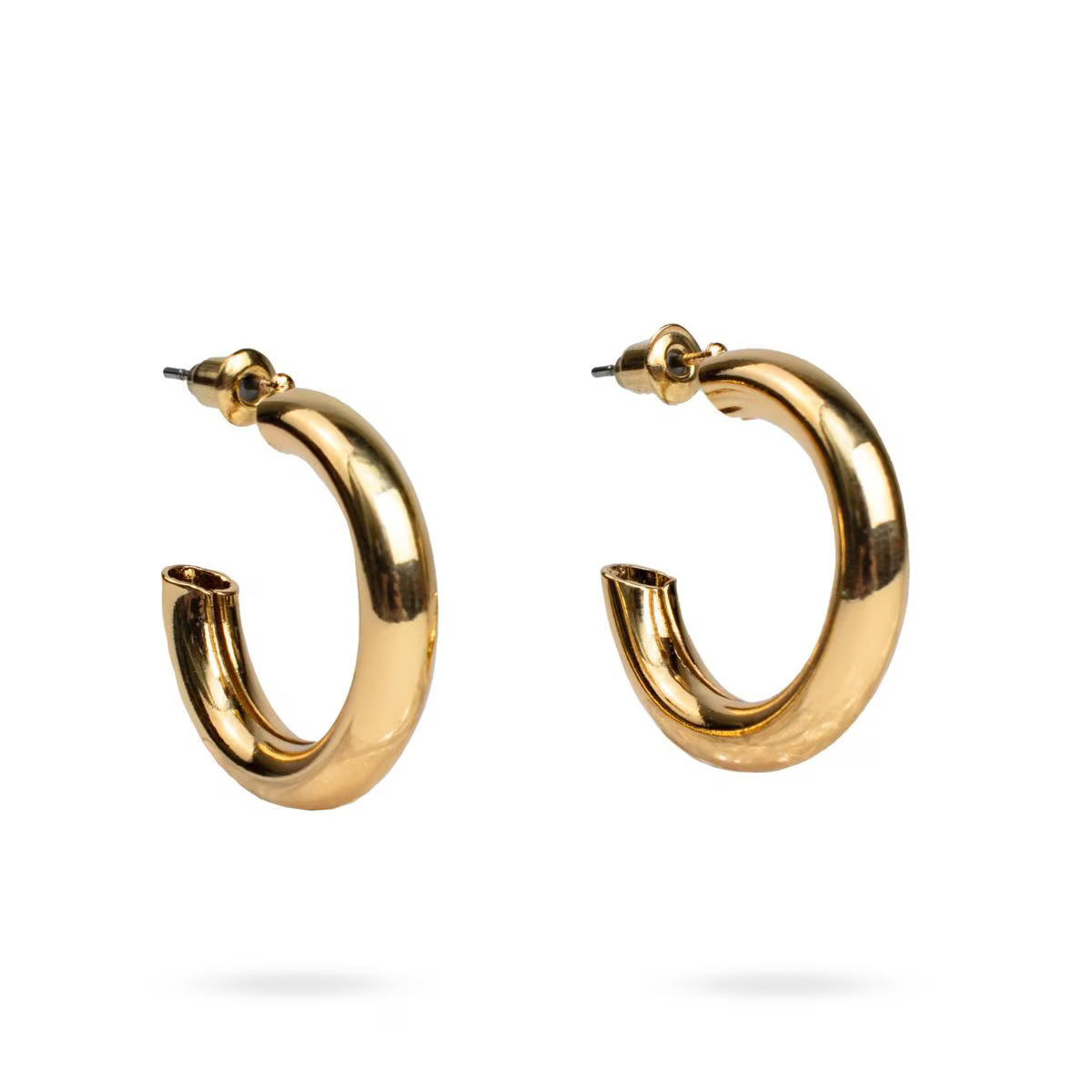 Gold hoop earrings on a white background