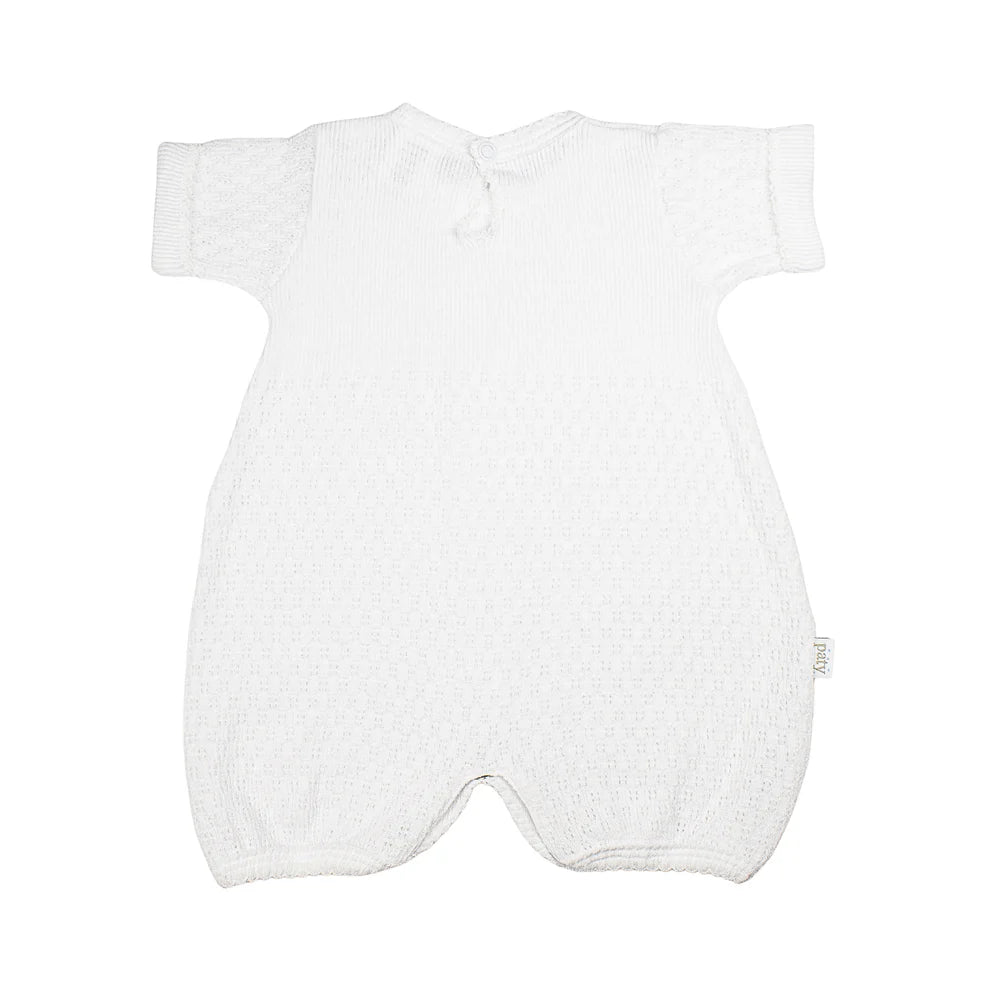 White baby onesie on a white background