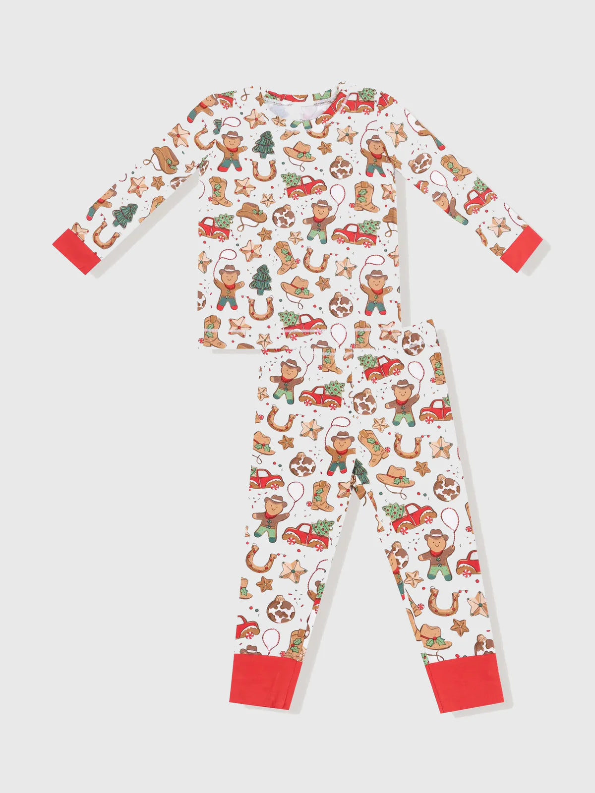 Children's pajama set with Christmas gingerbread man and reindeer pattern on a white background