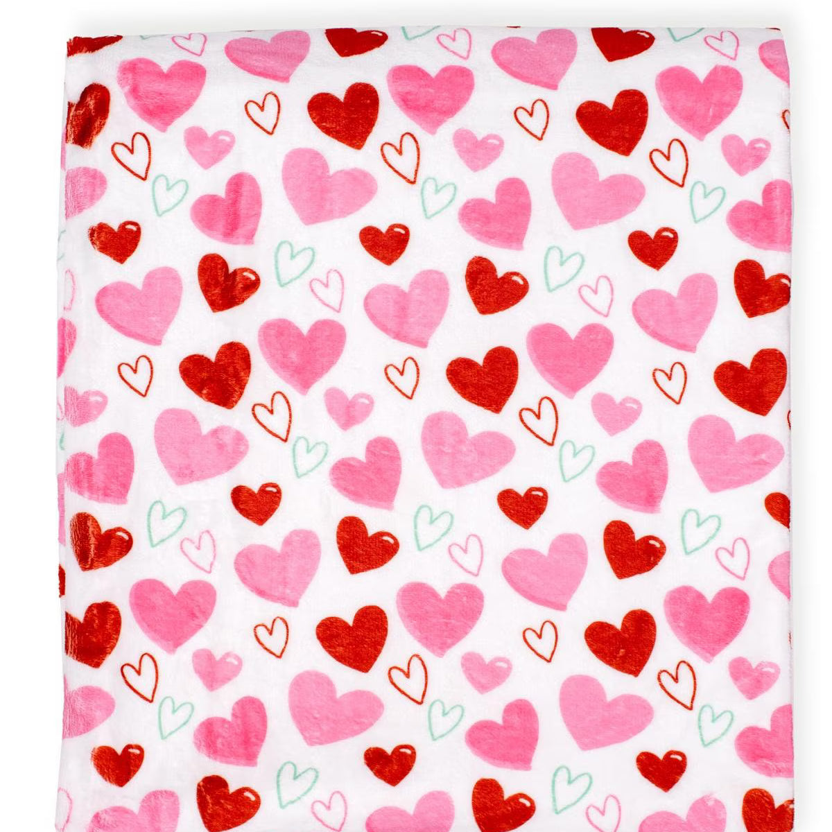 Blanket with red and pink heart pattern on a white background