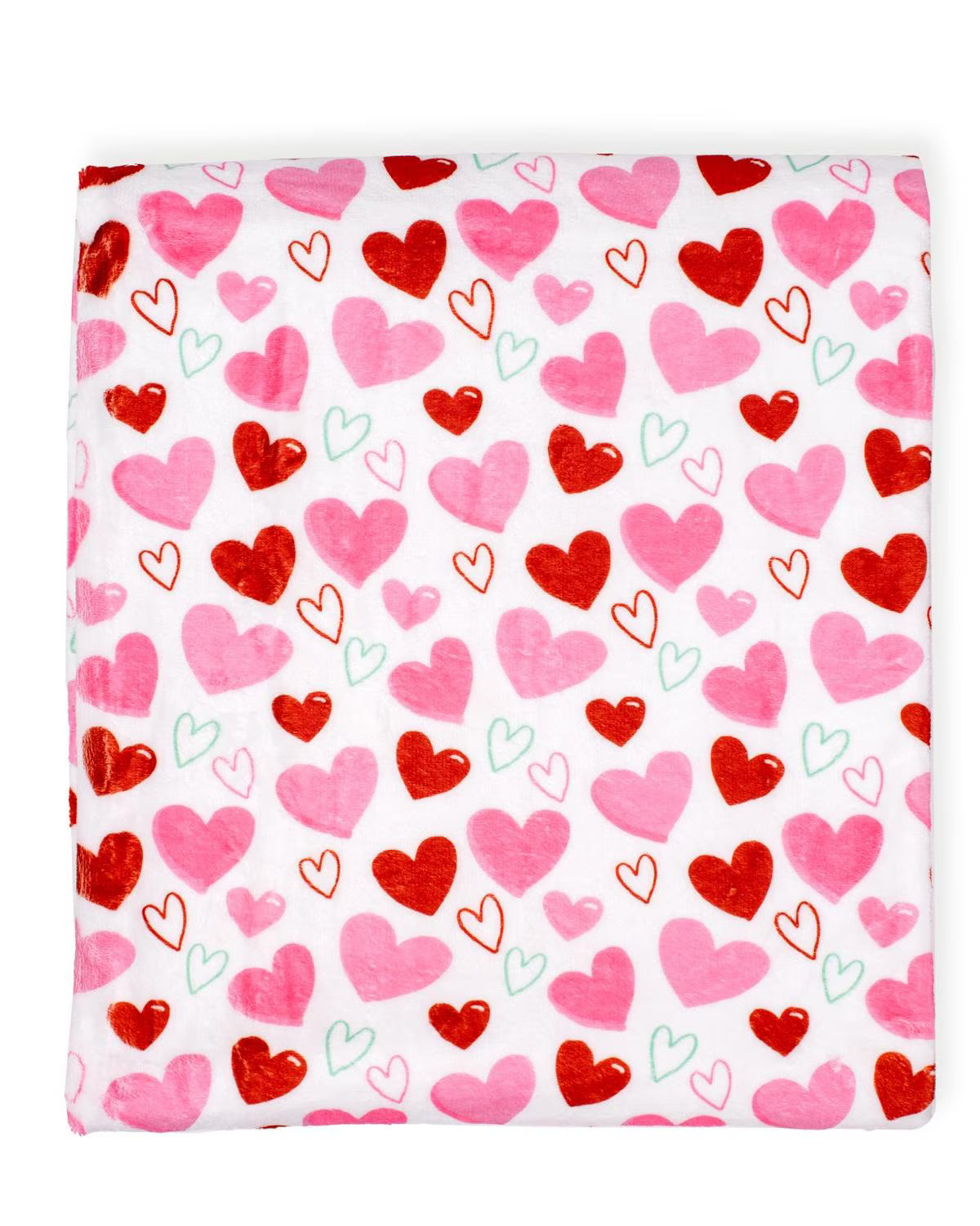 Blanket with red and pink heart pattern on a white background