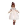 Textile doll with a white dress and brown hair bun on a white background