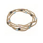 Set of three beaded bracelets with gold, black, and multicolor beads on a white background