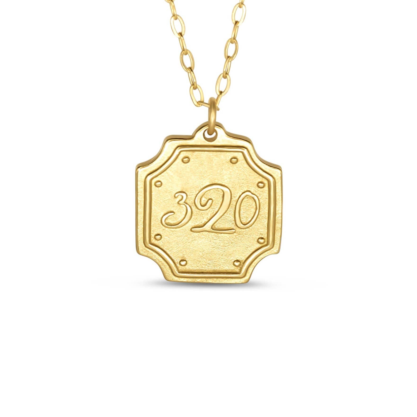 Gold necklace with a hexagonal pendant displaying the number '320' on a white background