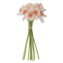 Bouquet of artificial flowers with peach-colored blossoms on a white background