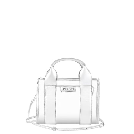 A small metallic silver handbag with top handles and a shoulder strap, featuring a rectangular front plaque that reads 'CASE-MATE', shown on a plain white background.