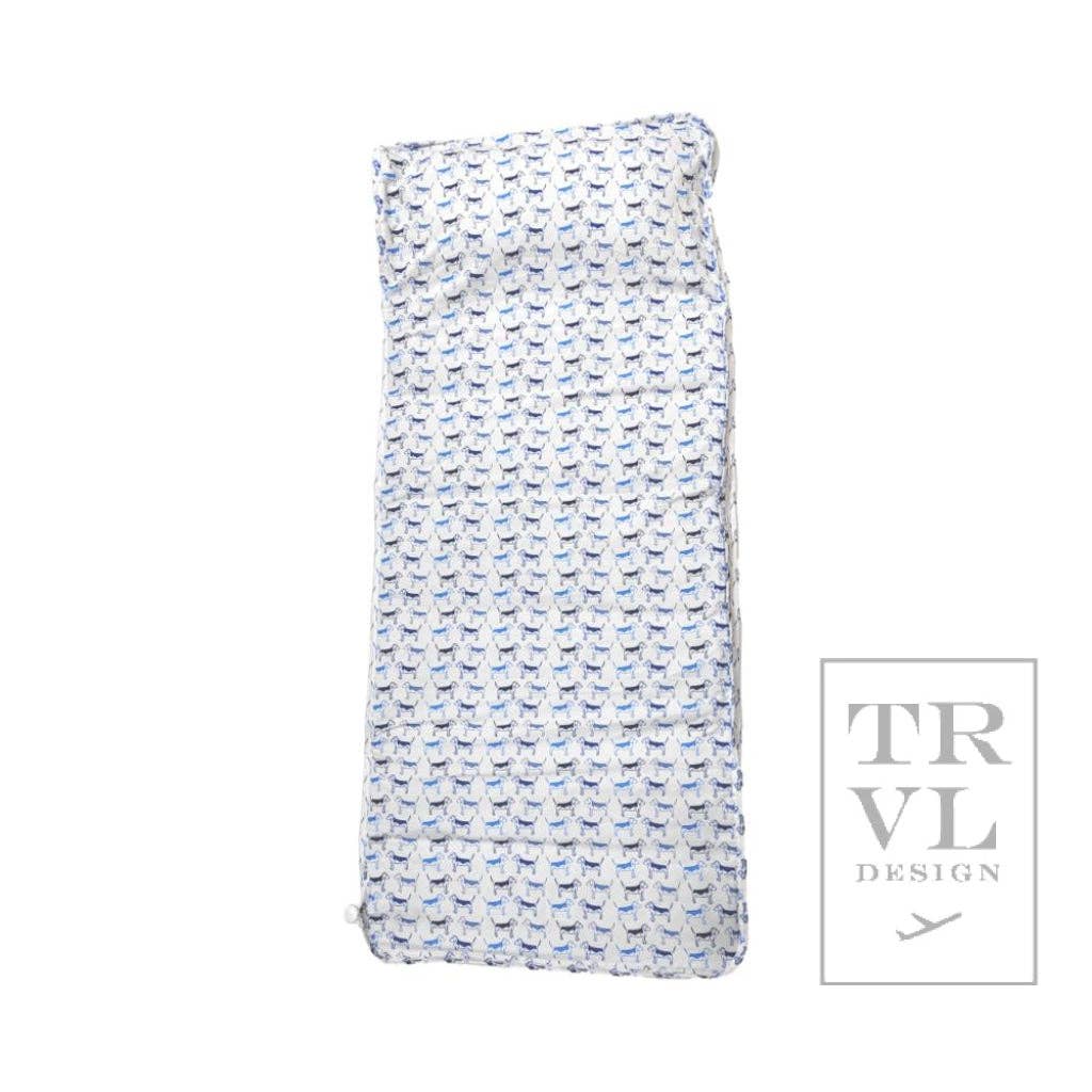 Folded fabric nap mat with blue dog pattern on a white background