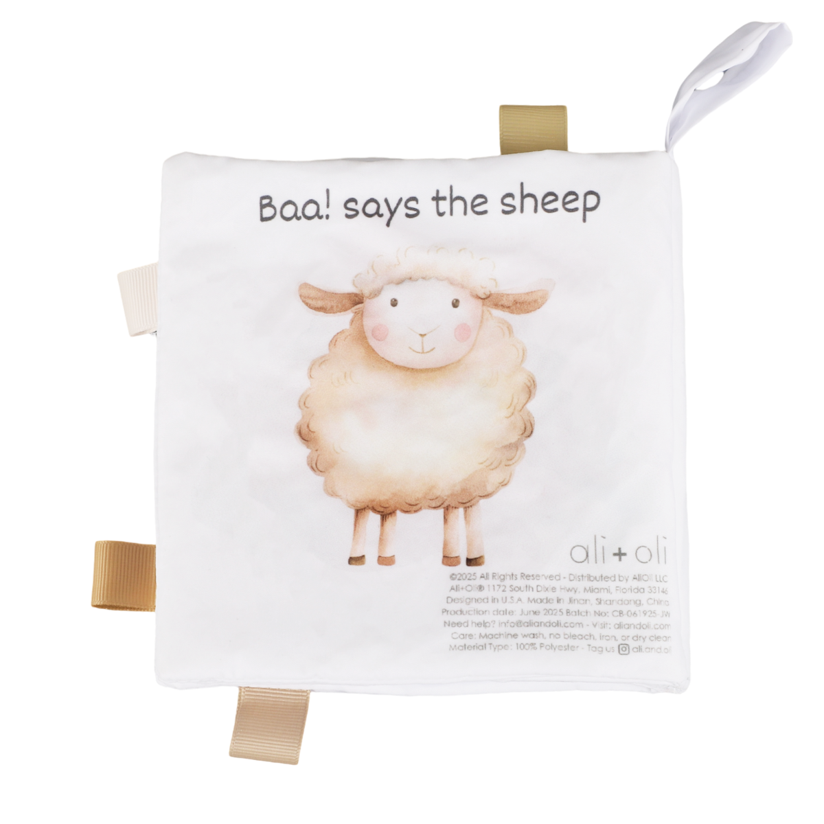 Soft crinkle cloth baby book page featuring sheep illustration with fabric tags
