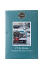 A teal scented candle packet from Candle Craft, featuring a vintage snow-covered truck with a wreath and red bow, and the text 'I'll Be Home.'.