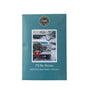 A teal scented candle packet from Candle Craft, featuring a vintage snow-covered truck with a wreath and red bow, and the text 'I'll Be Home.'.