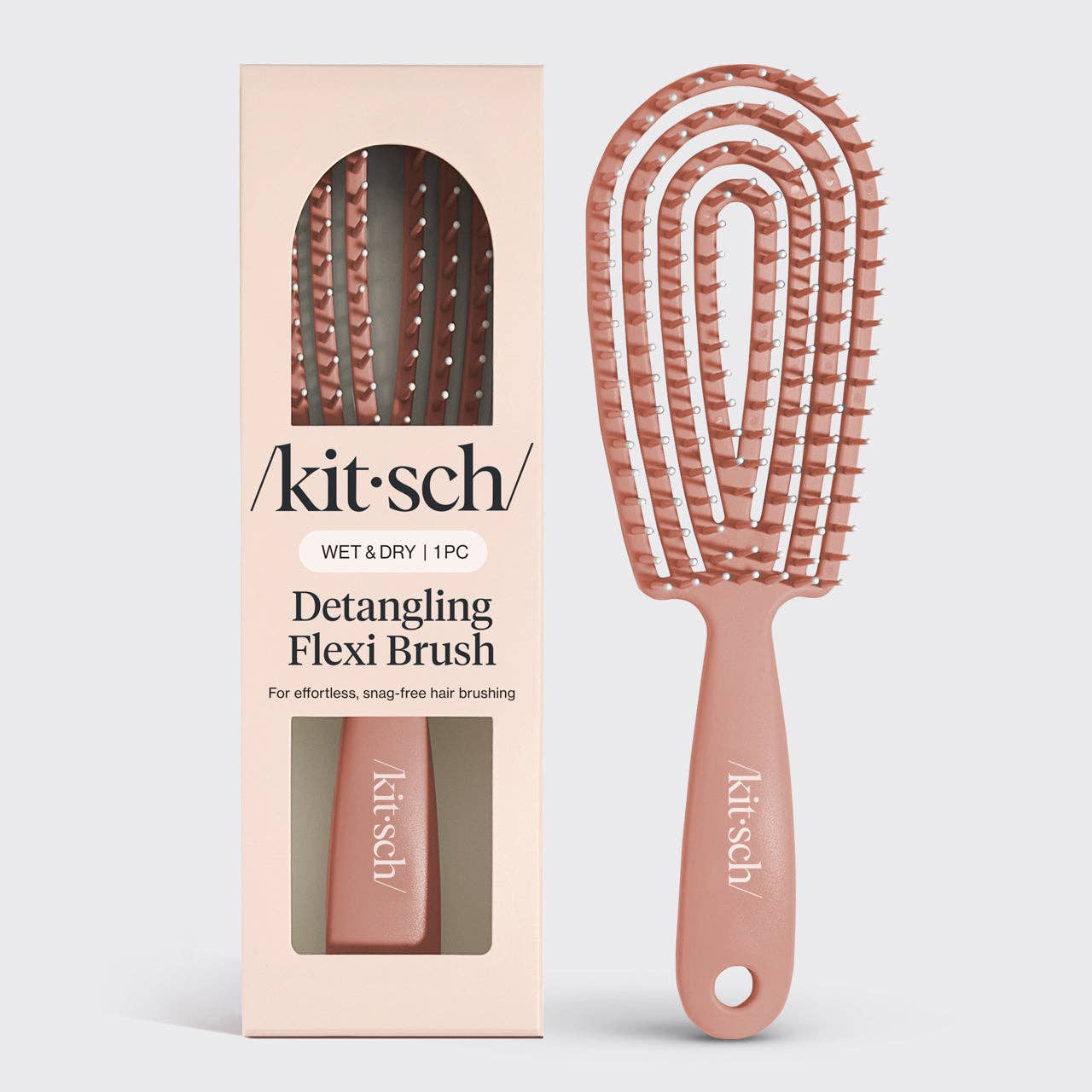 Detangling flexi brush with packaging on a white background