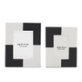 Two black and white geometric patterned boxes on a white background