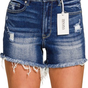 Blue denim shorts with a brand tag on a white background