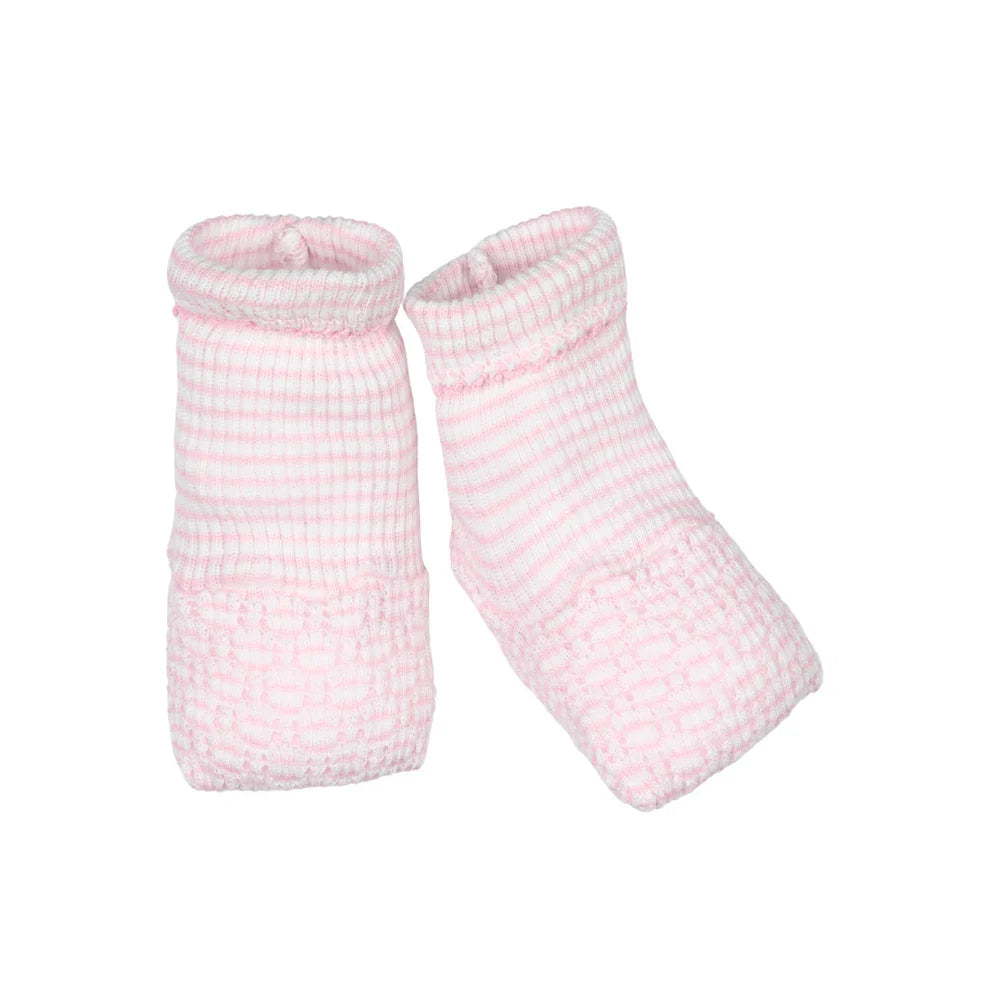Pair of pink baby socks on a white background