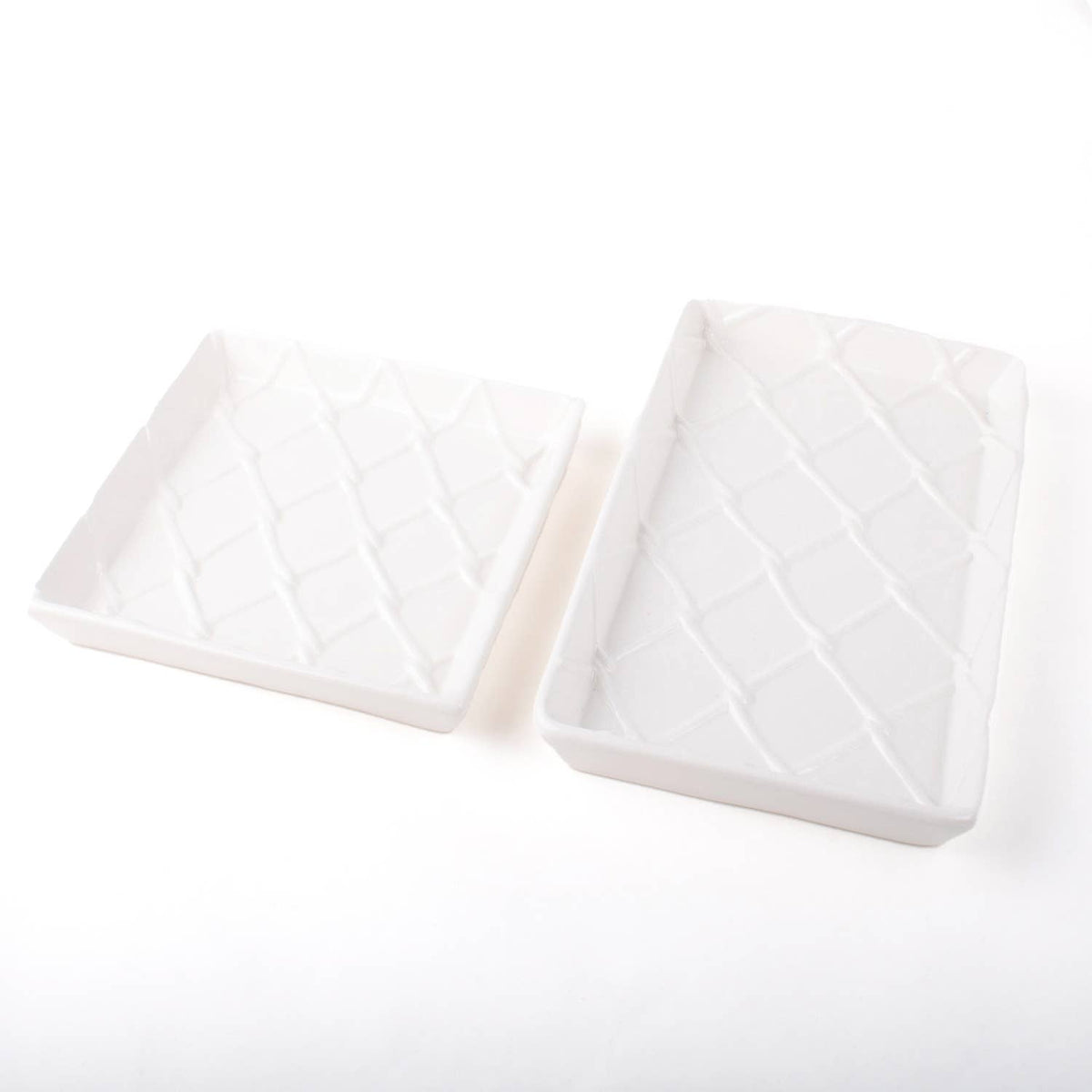 Pair of white textured ceramic towel trays, rectangular with raised grid pattern